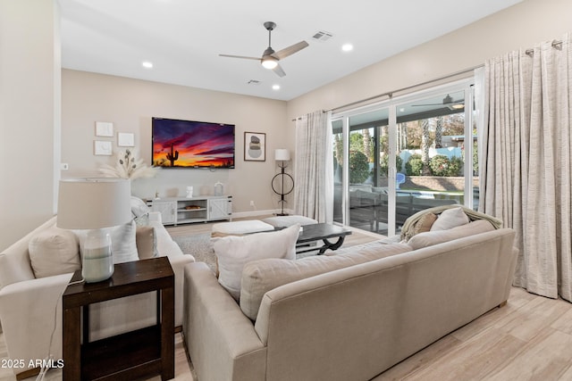 6220 E Paradise Ln, Scottsdale, AZ 85254 - living room featuring ceiling fan, light wood-style floors, and recessed lighting