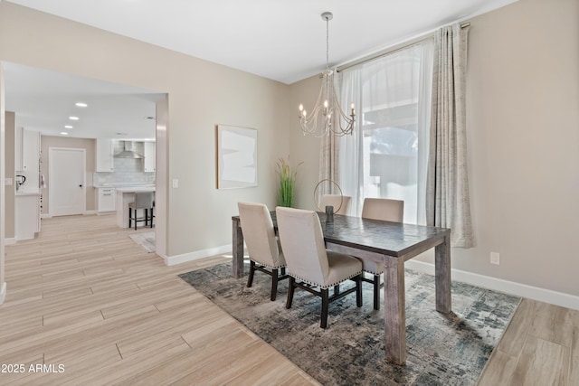 6220 E Paradise Ln, Scottsdale, AZ 85254 - dining area with a chandelier, light wood-style flooring, baseboards, and recessed lighting