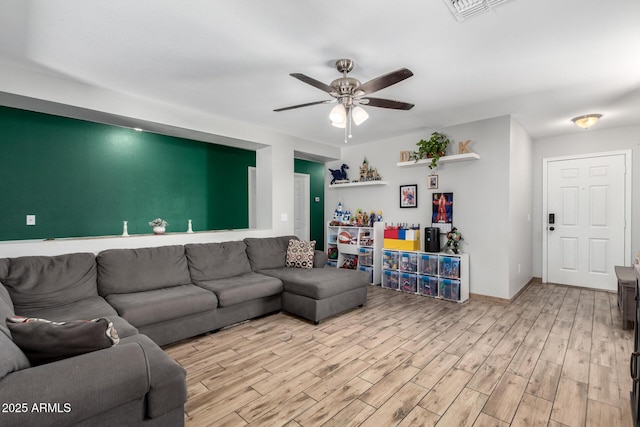 3438 S Bowman Rd, Apache Junction, AZ 85119 - living area with a ceiling fan and wood finished floors