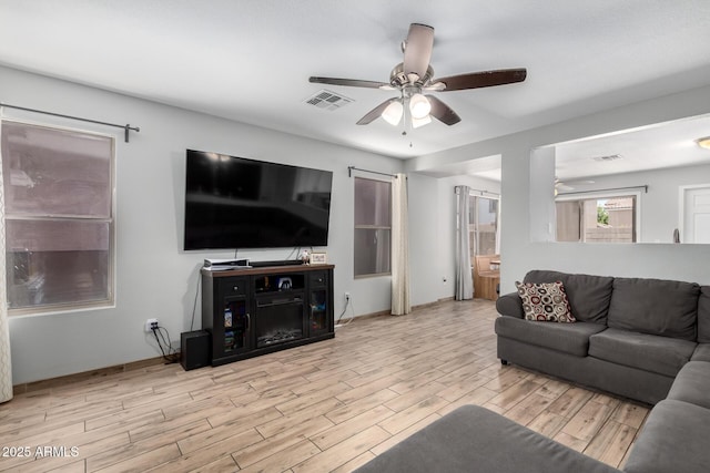3438 S Bowman Rd, Apache Junction, AZ 85119 - living area with ceiling fan and wood finished floors