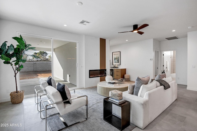 living room featuring ceiling fan