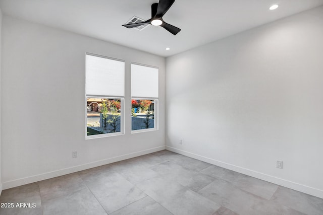 unfurnished room with ceiling fan