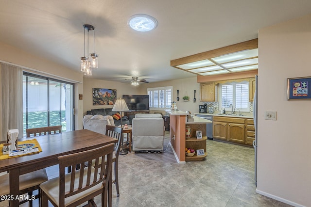 8160 E Keats Ave Unit 364, Mesa, AZ 85209 - dining space featuring plenty of natural light, ceiling fan, and baseboards