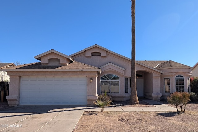 single story home featuring a garage