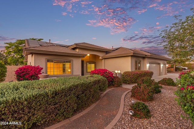 view of front of home featuring a garage