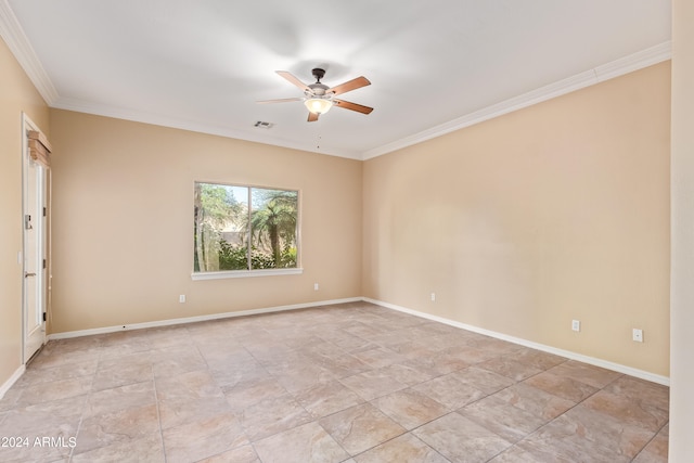 empty room featuring crown molding and ceiling fan