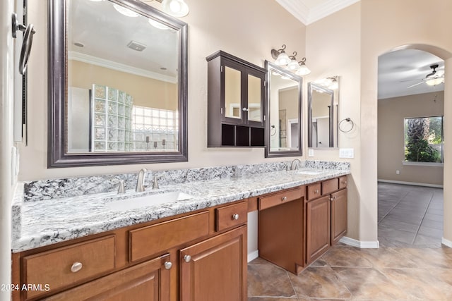 bathroom with vanity, tile patterned floors, ornamental molding, and ceiling fan