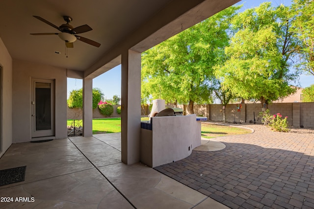 view of patio / terrace featuring ceiling fan