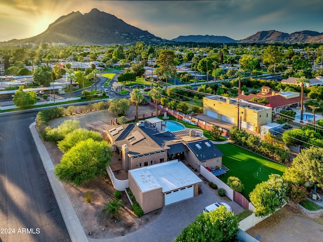 aerial view at dusk with a mountain view