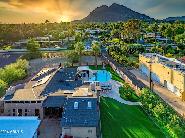 aerial view at dusk with a mountain view