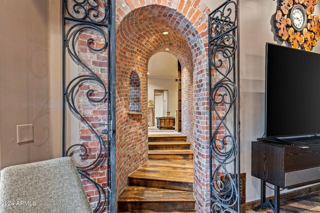 stairway with brick wall