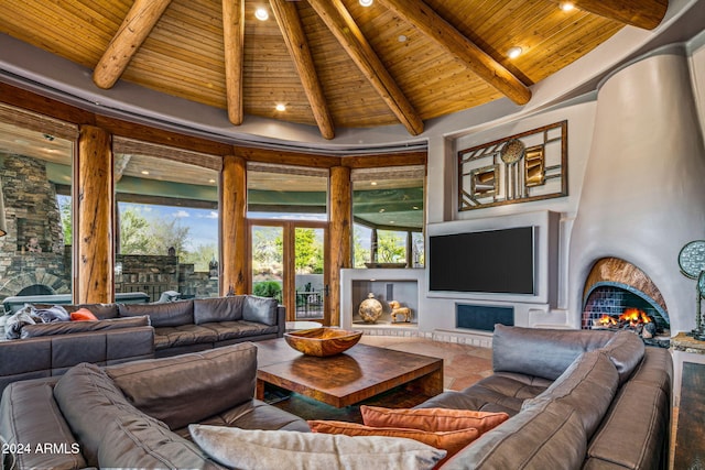 living room with beamed ceiling, high vaulted ceiling, and wooden ceiling