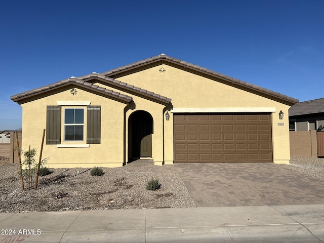 view of front of property featuring a garage