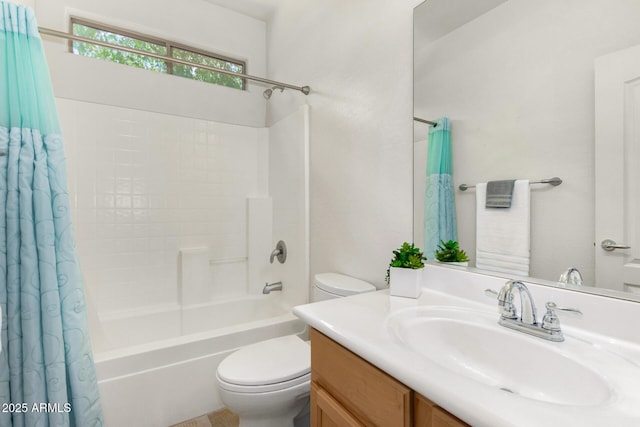 full bathroom with vanity, shower / tub combo with curtain, and toilet