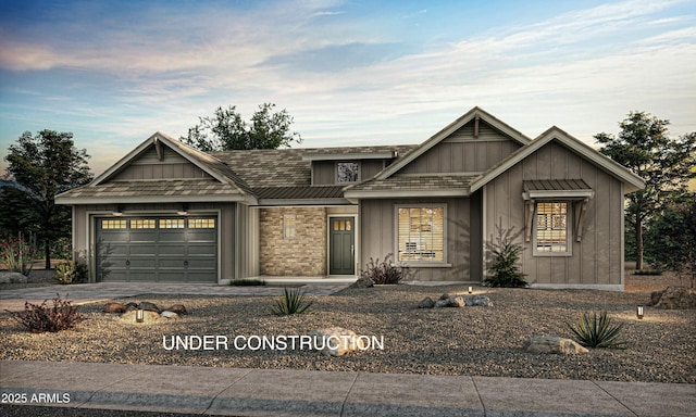 view of front of property with a garage