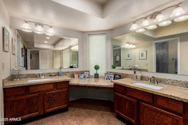 4601 E Sunnyside Ln, Phoenix, AZ 85032 - full bathroom with a tray ceiling, tile patterned floors, and two vanities