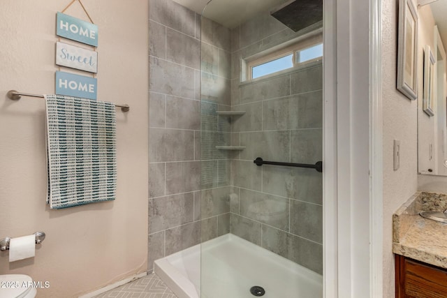 4601 E Sunnyside Ln, Phoenix, AZ 85032 - bathroom with tiled shower, vanity, and toilet