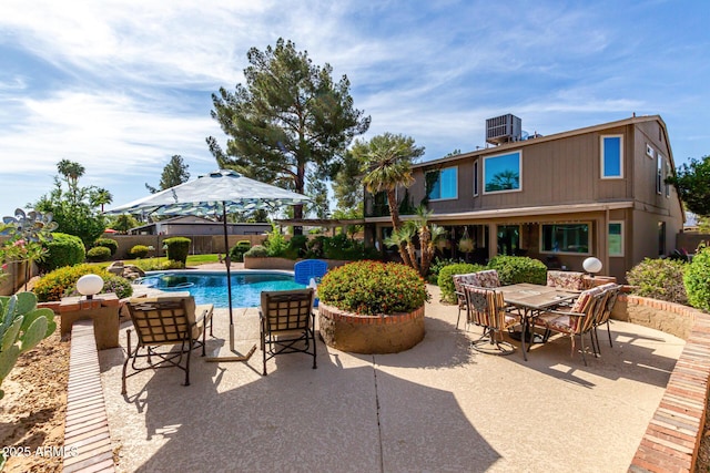 4601 E Sunnyside Ln, Phoenix, AZ 85032 - view of swimming pool with a patio, a fenced backyard, and outdoor dining space