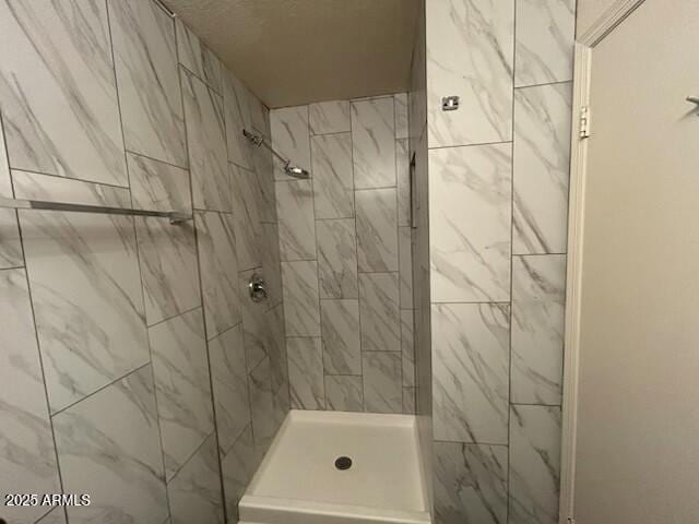 bathroom featuring a stall shower