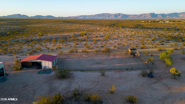 bird's eye view featuring a rural view and a mountain view