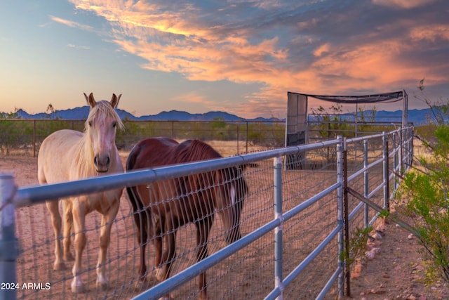 view of stable featuring a mountain view