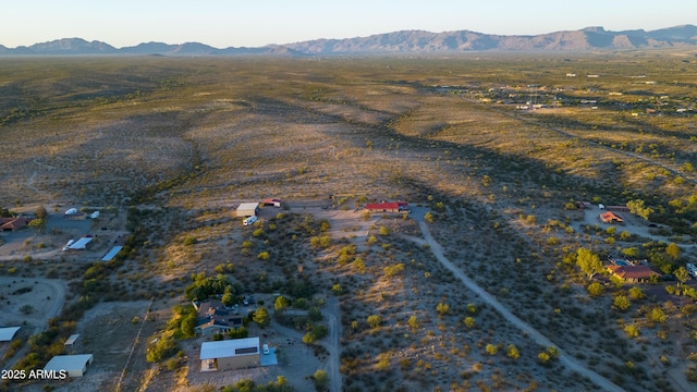 drone / aerial view with a rural view and a mountain view