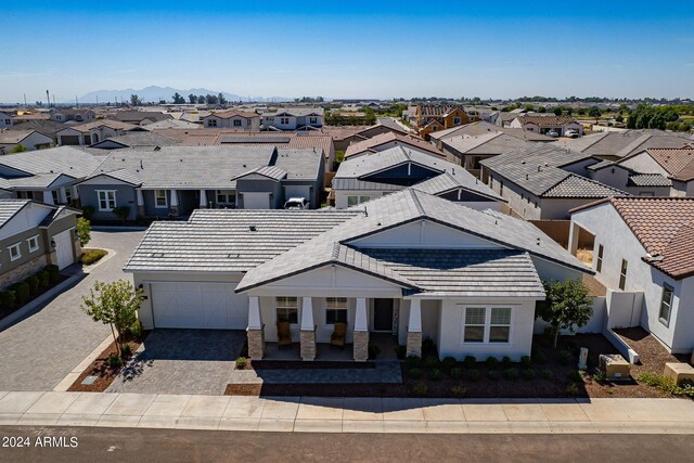 birds eye view of property featuring a mountain view