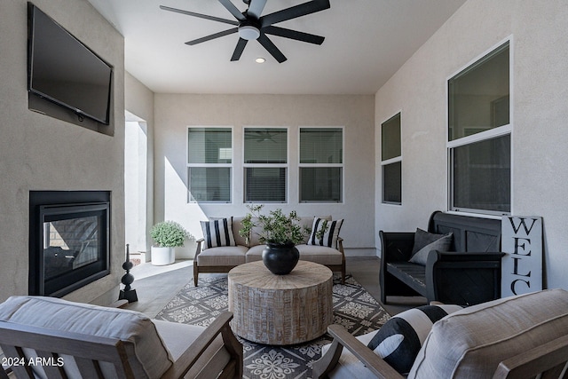 view of patio with an outdoor hangout area and ceiling fan