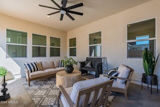 view of patio with ceiling fan and an outdoor hangout area