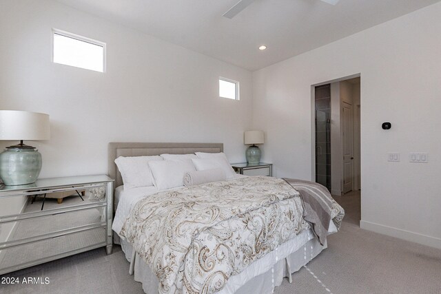 carpeted bedroom featuring ceiling fan