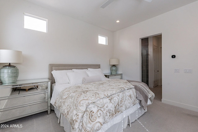 carpeted bedroom featuring ceiling fan