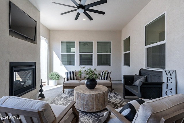 view of patio / terrace featuring an outdoor living space and ceiling fan