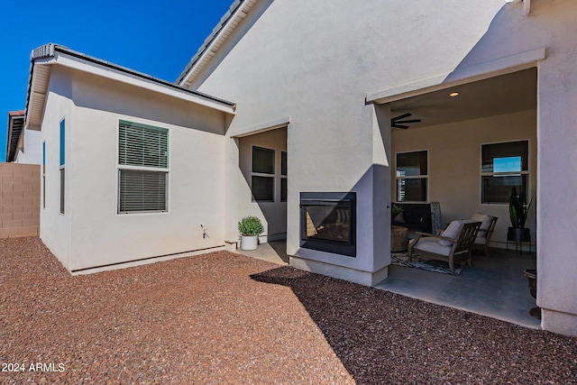 back of property with a patio