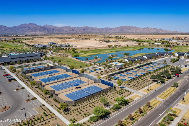 birds eye view of property featuring a water and mountain view