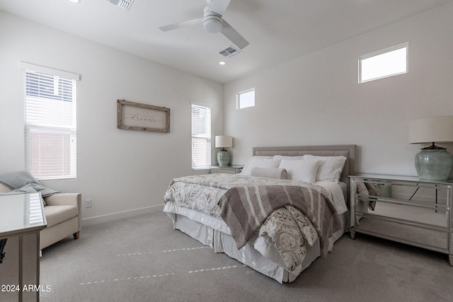 bedroom with ceiling fan and carpet floors