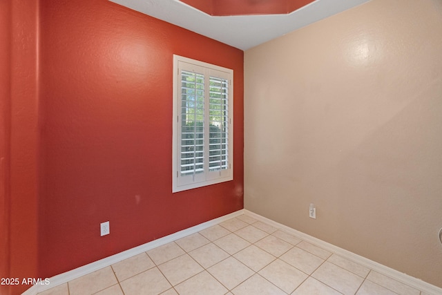 4202 N 21st St Unit 1, Phoenix, AZ 85016 - unfurnished room featuring light tile patterned floors and baseboards