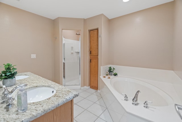 4202 N 21st St Unit 1, Phoenix, AZ 85016 - full bathroom featuring a shower stall, a garden tub, tile patterned flooring, and double vanity