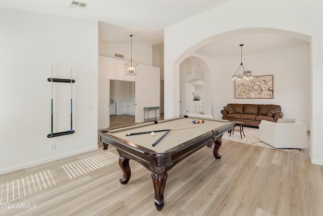 recreation room with pool table, lofted ceiling, and wood-type flooring