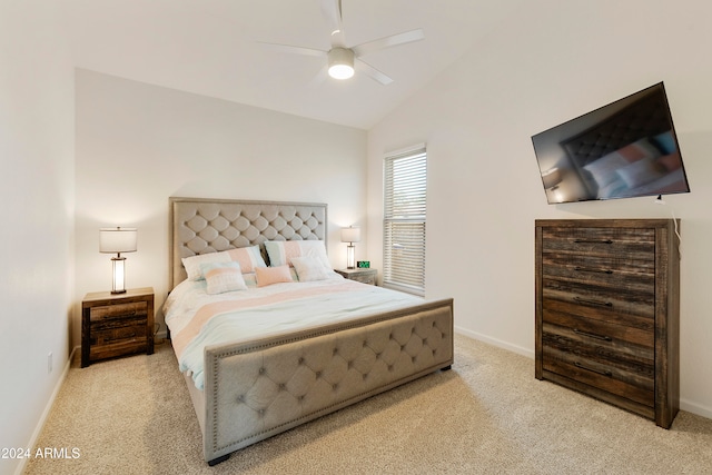 carpeted bedroom featuring vaulted ceiling and ceiling fan