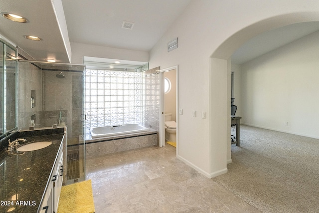 full bathroom featuring plus walk in shower, lofted ceiling, toilet, and vanity