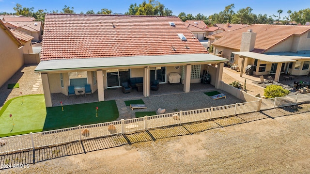 back of house featuring a patio area