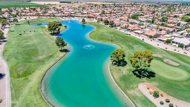 bird's eye view featuring a beach view and a water view