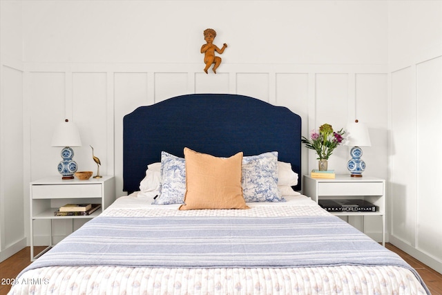 bedroom featuring wood-type flooring