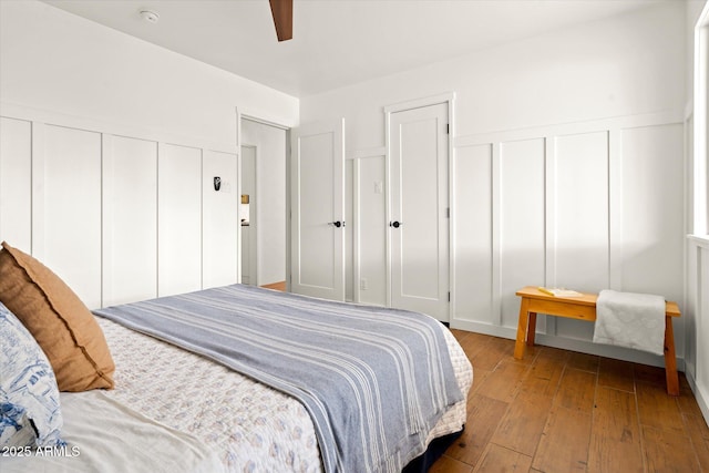 bedroom featuring light hardwood / wood-style floors and ceiling fan