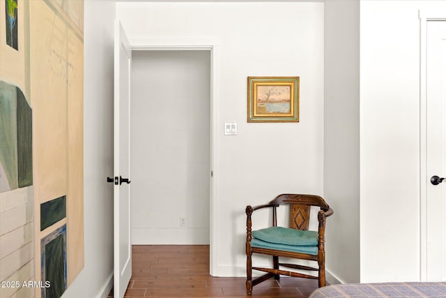 sitting room with dark hardwood / wood-style floors