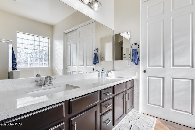 bathroom featuring vanity and tile patterned flooring