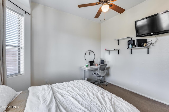 bedroom with ceiling fan and carpet flooring