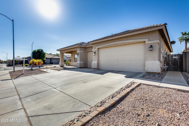 ranch-style home with a garage