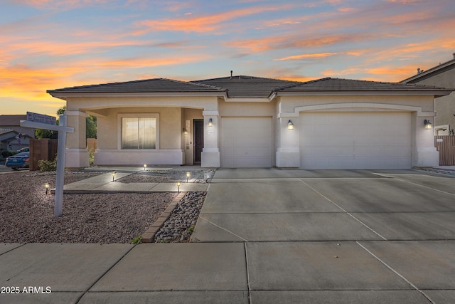 prairie-style house featuring a garage