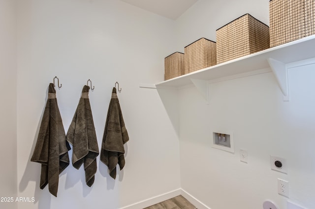 washroom featuring baseboards, laundry area, hookup for a washing machine, wood finished floors, and hookup for an electric dryer